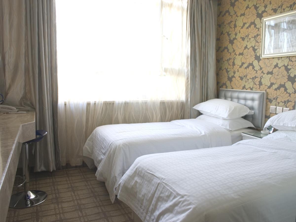 Xinyijia City Hotel Urumqi Buitenkant foto