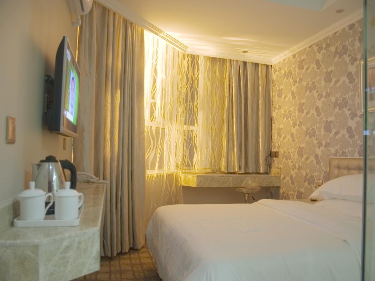 Xinyijia City Hotel Urumqi Buitenkant foto